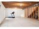 Unfinished basement showcasing open layout and exposed beam ceiling with room for customization at 4834 S Wenatchee St, Aurora, CO 80015