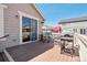 Inviting deck with a grill and outdoor seating area, perfect for summer gatherings at 4834 S Wenatchee St, Aurora, CO 80015