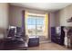 Cozy office features a desk, storage and a window offering great natural light at 4834 S Wenatchee St, Aurora, CO 80015