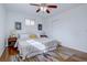Spacious bedroom with hardwood floors and ceiling fan at 12866 E Ohio Ave, Aurora, CO 80012