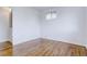 Bright bedroom with hardwood floors and neutral walls at 12866 E Ohio Ave, Aurora, CO 80012