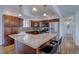 Updated kitchen featuring stainless steel appliances and granite island at 12866 E Ohio Ave, Aurora, CO 80012