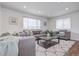 Bright living room featuring hardwood floors and comfy seating at 12866 E Ohio Ave, Aurora, CO 80012