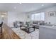 Spacious living room with hardwood floors and ample natural light at 12866 E Ohio Ave, Aurora, CO 80012