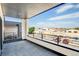 This modern balcony features sleek black railings and offers ample outdoor space at 2400 S Delaware St # 1, Denver, CO 80223