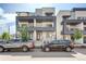 Modern townhome exterior with balconies and sleek design at 2400 S Delaware St # 1, Denver, CO 80223