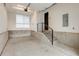 Spacious garage area with high ceilings and modern finishes at 2400 S Delaware St # 1, Denver, CO 80223