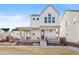 Charming two-story home features a welcoming front porch and well-maintained landscaping at 5984 Fulton St, Denver, CO 80238