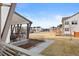Inviting front yard and porch, ideal for relaxation and enjoying neighborhood views at 5984 Fulton St, Denver, CO 80238