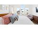 Close-up of main bedroom featuring large windows and cozy decor at 5984 Fulton St, Denver, CO 80238