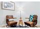 Comfortable seating area with stylish accent chairs and modern decor, perfect for relaxation and conversation at 5984 Fulton St, Denver, CO 80238