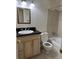 Functional bathroom featuring modern fixtures and a combination tub/shower for convenience at 16180 E Flora Pl, Aurora, CO 80013
