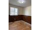 Bedroom with paneled accent wall and natural light at 16180 E Flora Pl, Aurora, CO 80013