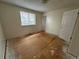 Bright bedroom with a large window and plenty of room for relaxation at 16180 E Flora Pl, Aurora, CO 80013