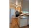 Bright kitchen with essential appliances and ample counter space, perfect for preparing delicious meals at 16180 E Flora Pl, Aurora, CO 80013