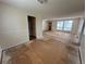 Open living room featuring large windows for natural light, ready for your personal touch at 16180 E Flora Pl, Aurora, CO 80013