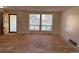 Large living room with hardwood floors and great natural light at 16180 E Flora Pl, Aurora, CO 80013