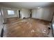 Large living room with hardwood floors and great natural light at 16180 E Flora Pl, Aurora, CO 80013