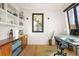 Bright home office with custom built-ins, sleek desk, and modern finishes at 1763 S Williams St, Denver, CO 80210
