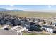 Expansive aerial view of the home showing solar panels, landscaping, and neighborhood at 17213 W 93Rd Pl, Arvada, CO 80007