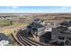 Aerial view of the property featuring a well-maintained backyard and scenic neighborhood views at 17213 W 93Rd Pl, Arvada, CO 80007