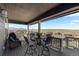 Relaxing deck with comfortable seating and mountain views offering a perfect spot for outdoor entertaining at 17213 W 93Rd Pl, Arvada, CO 80007