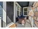 Inviting front porch with wicker seating and a 