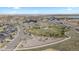 Aerial view of a neighborhood featuring community green spaces and residential homes at 17213 W 93Rd Pl, Arvada, CO 80007