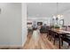 Seamless flow from the kitchen to the dining and living areas, ideal for modern living at 17213 W 93Rd Pl, Arvada, CO 80007