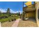 Well maintained backyard featuring a patio, deck access, and lovely landscaping elements at 14074 Yellow Tip Dr, Parker, CO 80134