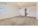 Large bedroom featuring plush carpeting and a connecting bathroom at 14074 Yellow Tip Dr, Parker, CO 80134