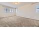 Spacious bedroom features plush carpeting and plenty of natural light at 14074 Yellow Tip Dr, Parker, CO 80134