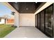 Modern back patio featuring recessed lighting, a dark wood plank ceiling and sliding glass doors at 535 Albion St, Denver, CO 80220