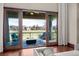 A balcony featuring comfortable outdoor seating and views of the golf course at 9099 E Harvard Ave, Denver, CO 80231