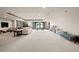 Spacious basement featuring carpeted floors, recessed lighting, and plenty of room for activities at 9099 E Harvard Ave, Denver, CO 80231