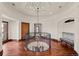 Spacious hallway on the second floor featuring wooden floors and a decorative ceiling at 9099 E Harvard Ave, Denver, CO 80231