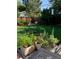 Lush garden featuring plants, flowers, and garden beds, offering a tranquil outdoor space at 6614 Everett St, Arvada, CO 80004