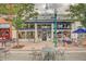 Attractive storefront of Scrumptious Candy and Soda shop with outdoor seating at 6614 Everett St, Arvada, CO 80004