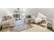 Bright bedroom with twin beds, soft carpet, and elegant decor at 3015 Lowell Blvd, Denver, CO 80211