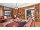 Spacious living room with custom built-in shelves, a large painting, and comfortable seating at 3015 Lowell Blvd, Denver, CO 80211