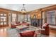Cozy living room features a fireplace, comfortable seating, and natural lighting at 3015 Lowell Blvd, Denver, CO 80211