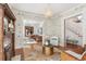 Inviting living room with hardwood floors, decorative fireplace, and a view into adjacent rooms at 3015 Lowell Blvd, Denver, CO 80211