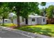 A cozy home with a well-manicured lawn and fresh mulch at 1180 Newark St, Aurora, CO 80010