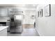 Modern kitchen with stainless steel appliances and an open layout at 1180 Newark St, Aurora, CO 80010