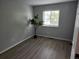 A simple, clean bedroom with plenty of space for relaxation and personalization at 20521 E Bellewood Pl, Aurora, CO 80015
