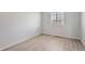 Bedroom featuring vinyl flooring, natural light, and neutral paint at 20521 E Bellewood Pl, Aurora, CO 80015
