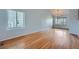 Spacious living room with hardwood floors and large windows at 20521 E Bellewood Pl, Aurora, CO 80015