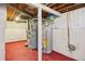 Image of basement featuring the water heater and furnace at 4465 S Bannock St, Englewood, CO 80110