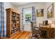 Versatile room with bookshelf, desk, and chair, ideal for a home office or study at 4465 S Bannock St, Englewood, CO 80110