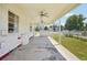 Cozy covered patio with ceiling fans, offering a relaxing outdoor space at 4465 S Bannock St, Englewood, CO 80110
